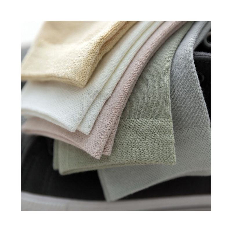 Calzini sportivi neri in cotone di bambù per donna con lavoro di compressione e spessore standard